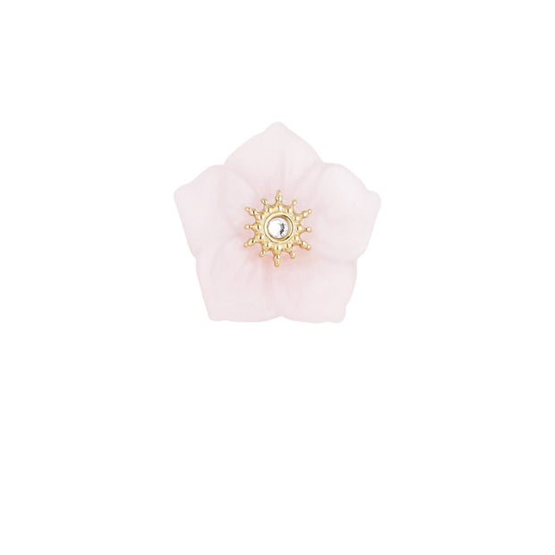 Rosa blomring med guldfärgad mitt mot vit bakgrund